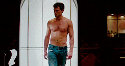 Christian Grey walking in his room in &quot;50 Shades of Grey&quot;