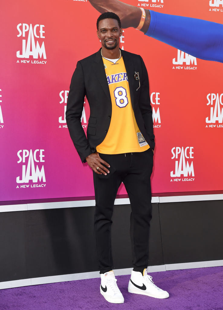 Chris Bosh attends the premiere of Warner Bros. &quot;Space Jam: A New Legacy&quot; in a Lakers jersey, blazer, and Nike shoes