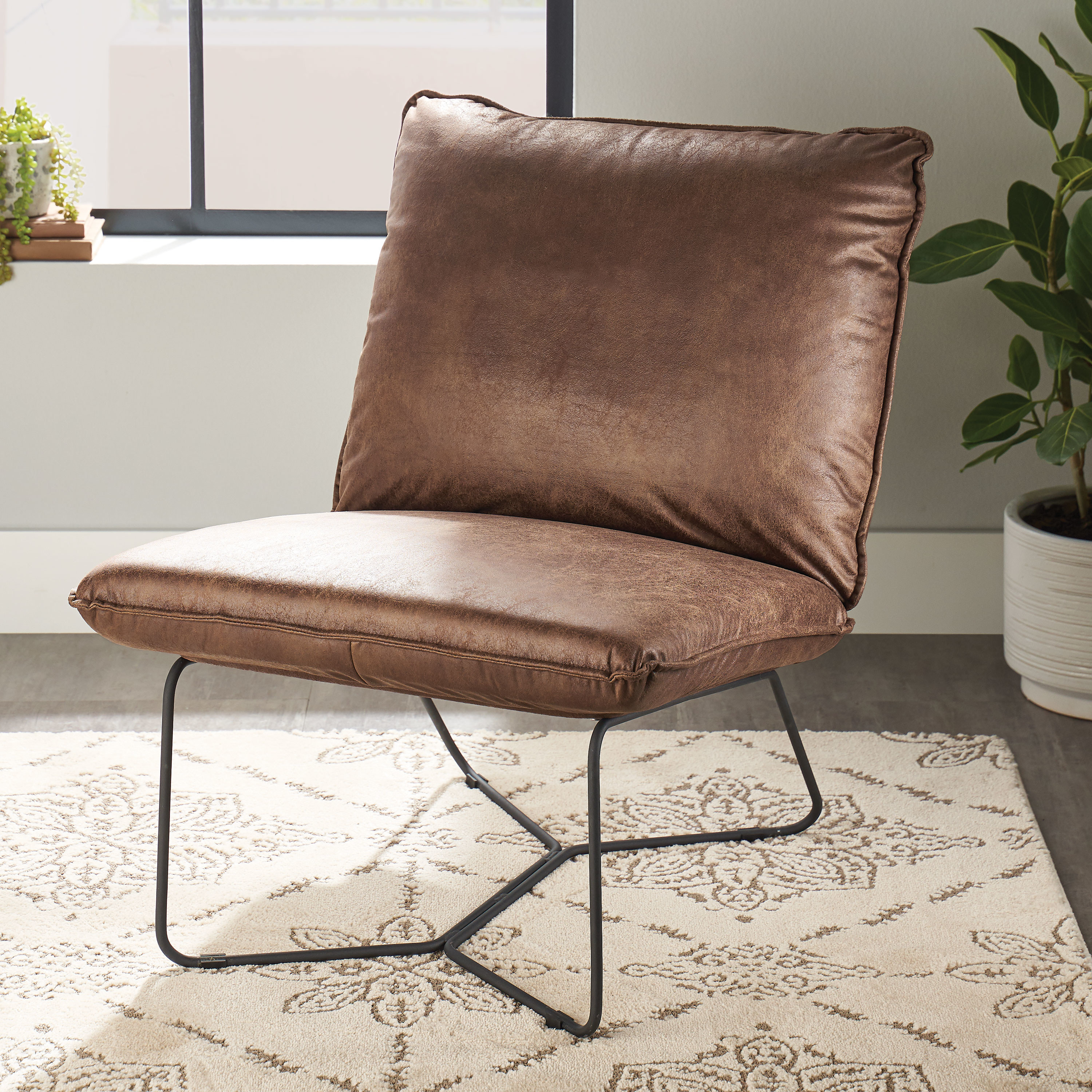 brown faux leather armless accent chair with metal base