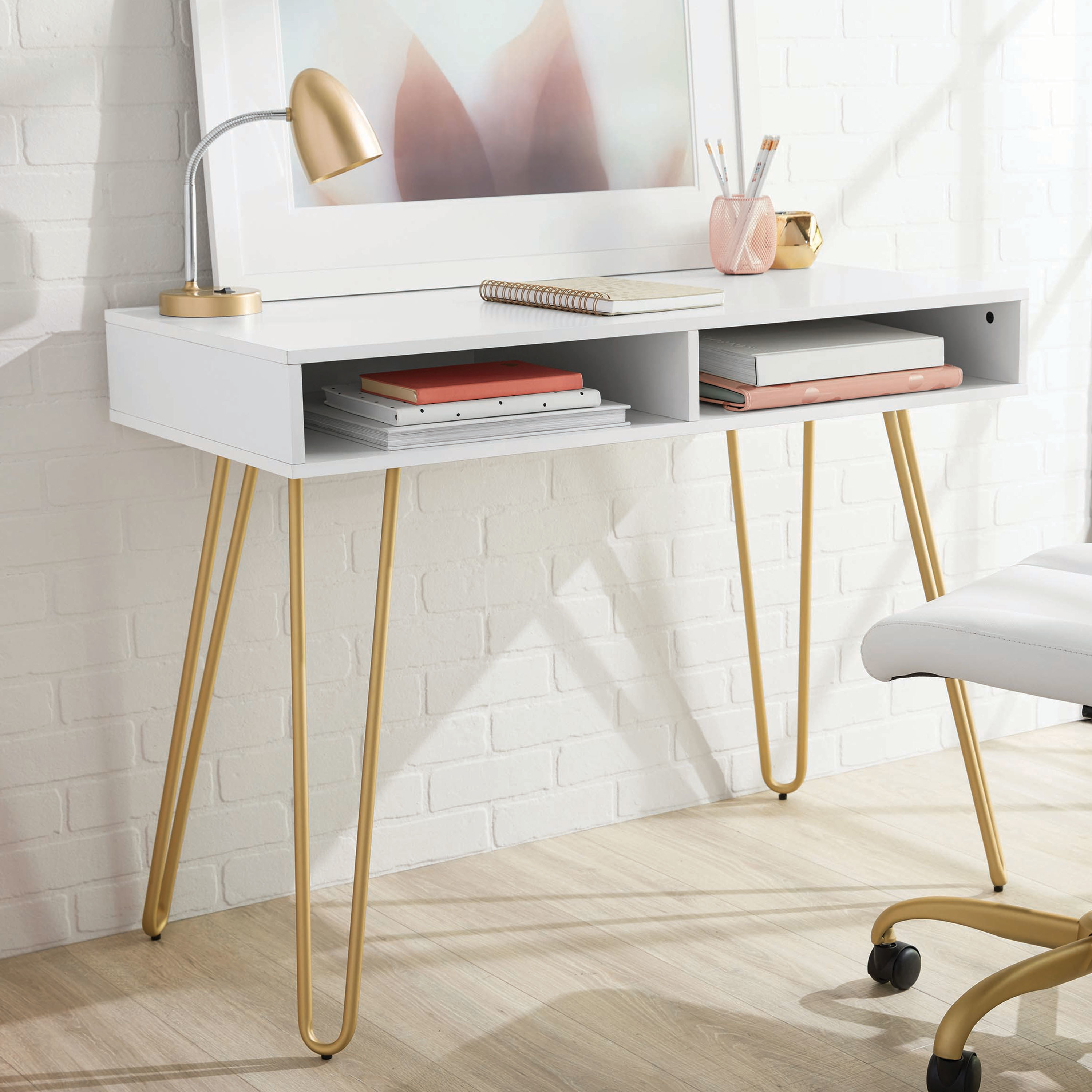 white writing desk with brass hairpin legs