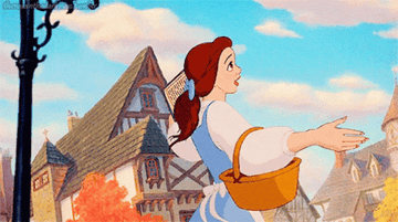 a gif of belle in the town square from beauty and the beast