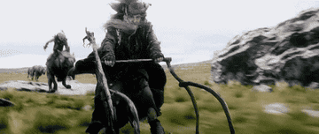 Woodland wizard from Lord of the Rings riding on his hares.