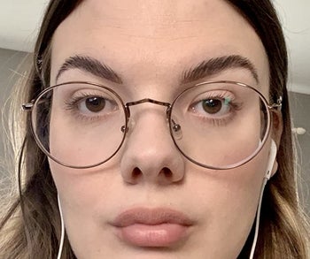 Reviewer showing fly aways before using product