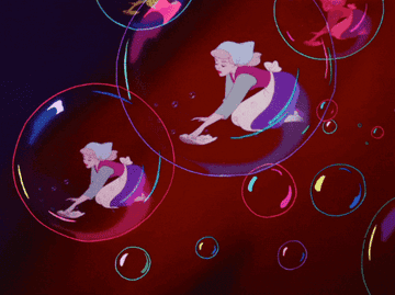a gif of cinderella cleaning inside of soap bubbles