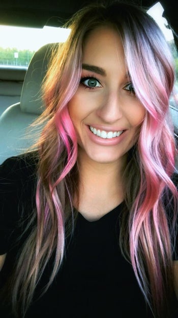 Reviewer with pink hair from using product