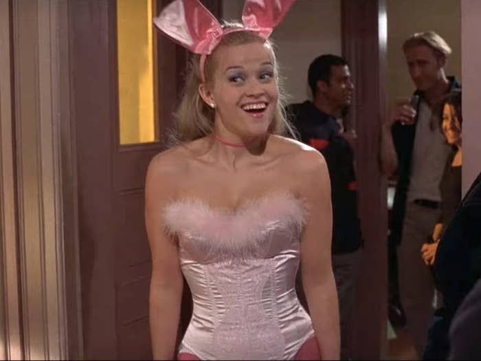 Elle arriving to the party dressed in a pink bunny costume