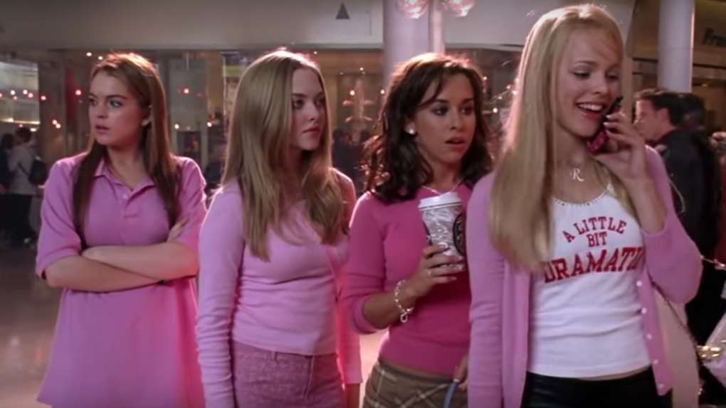 Regina and the rest of the plastics standing in the atrium of the mall
