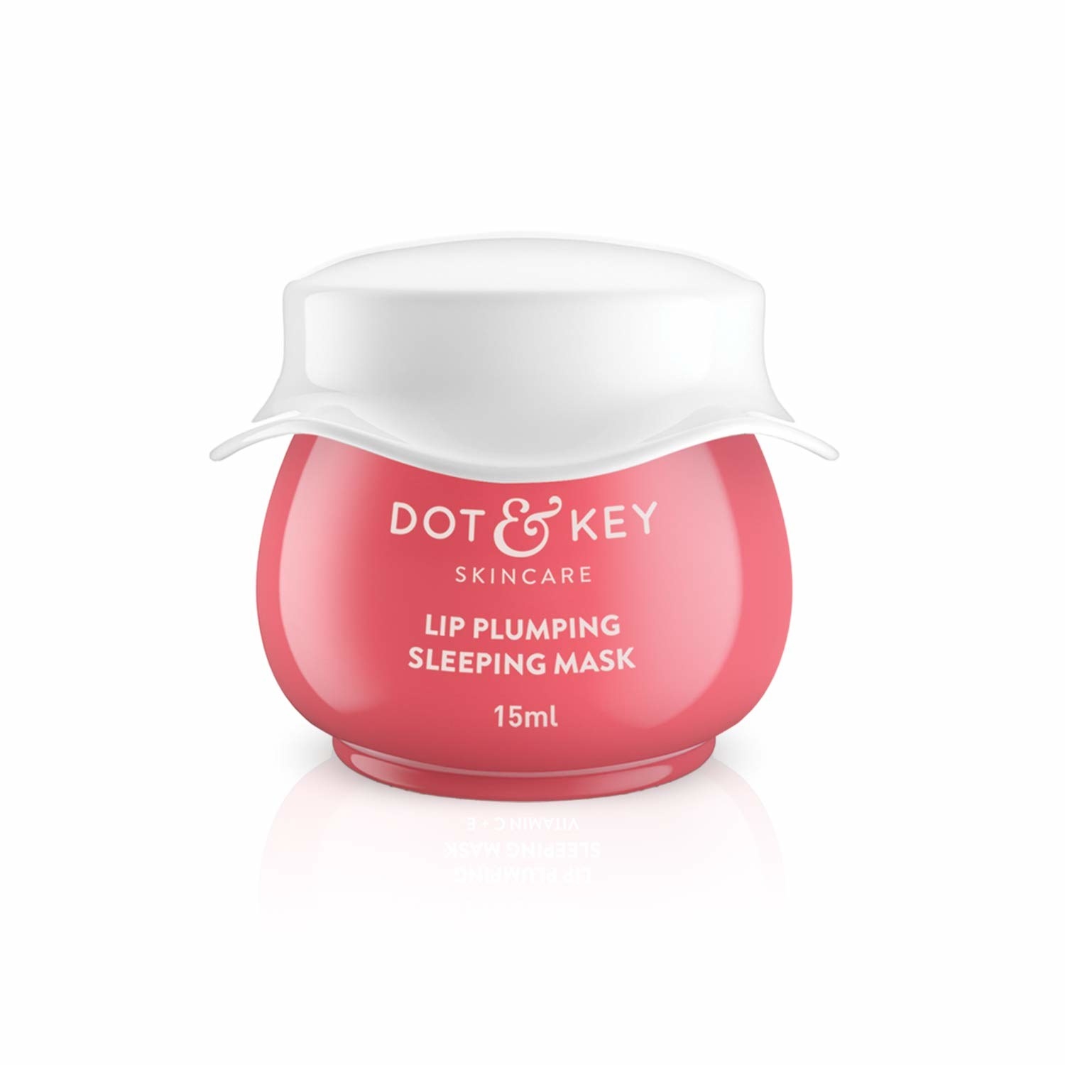 A pink bottle with a white hat-like cap of the lip plumping sleeping mask from Dot &amp;amp; Key.