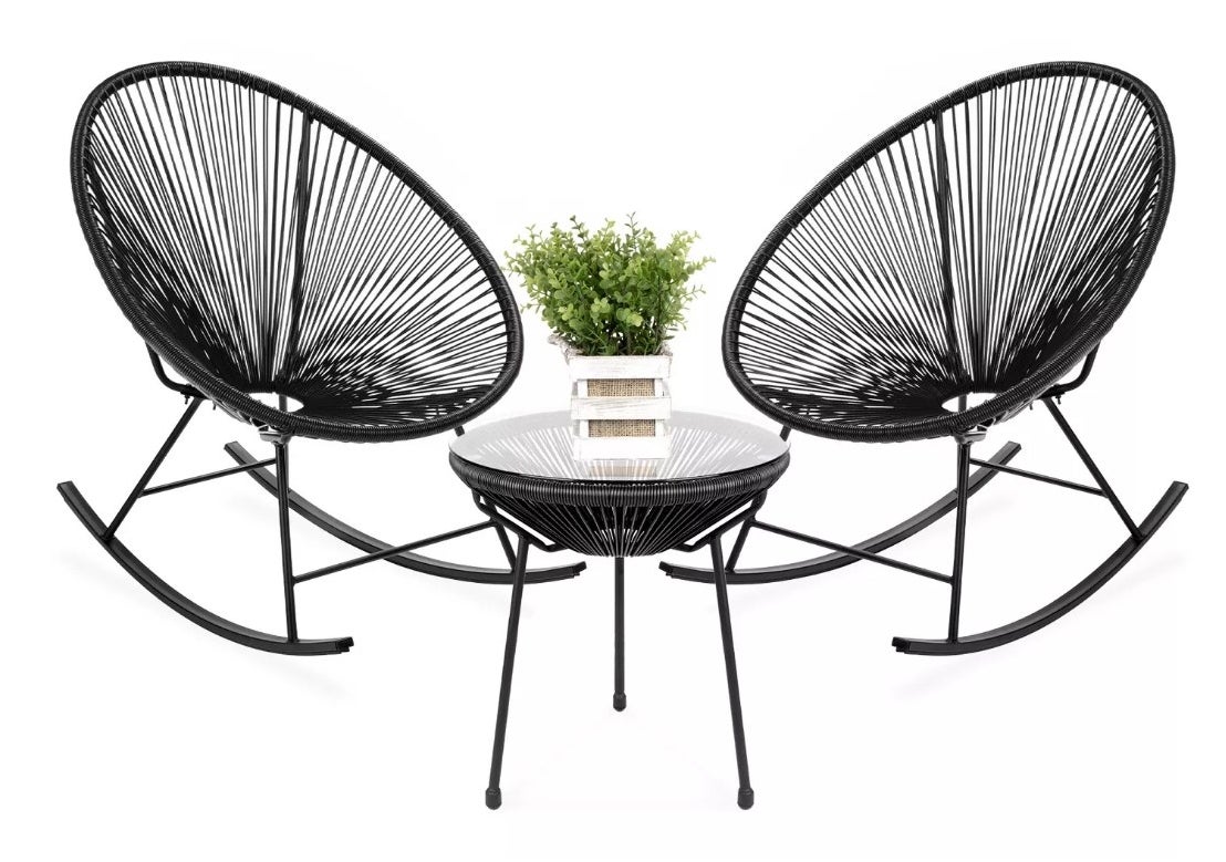 A black, woven rope bistro set with two rocking chairs and a table