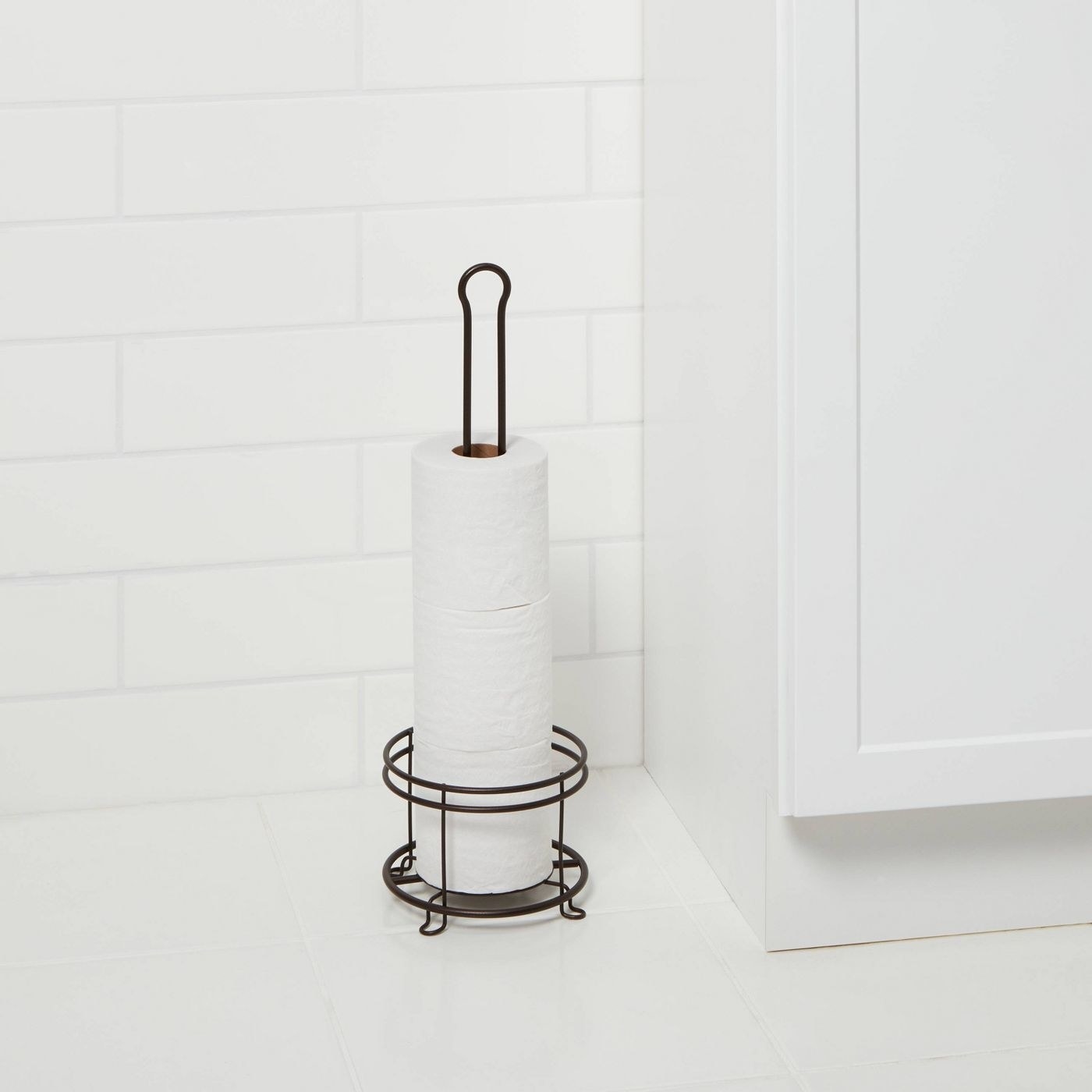 a matte black toilet paper holder