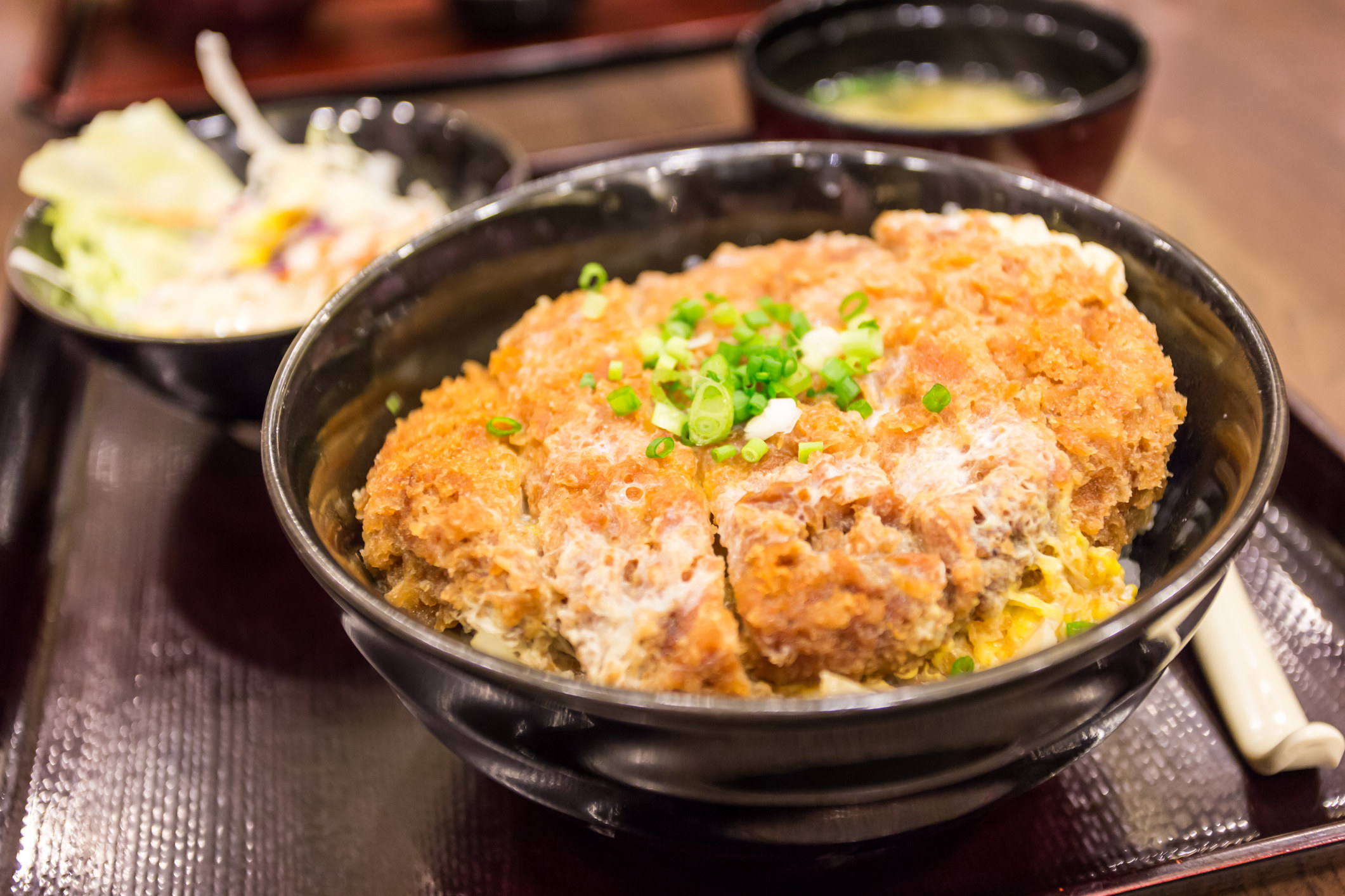 Japanese breaded deep-fried pork cutlet topped with egg on steamed rice