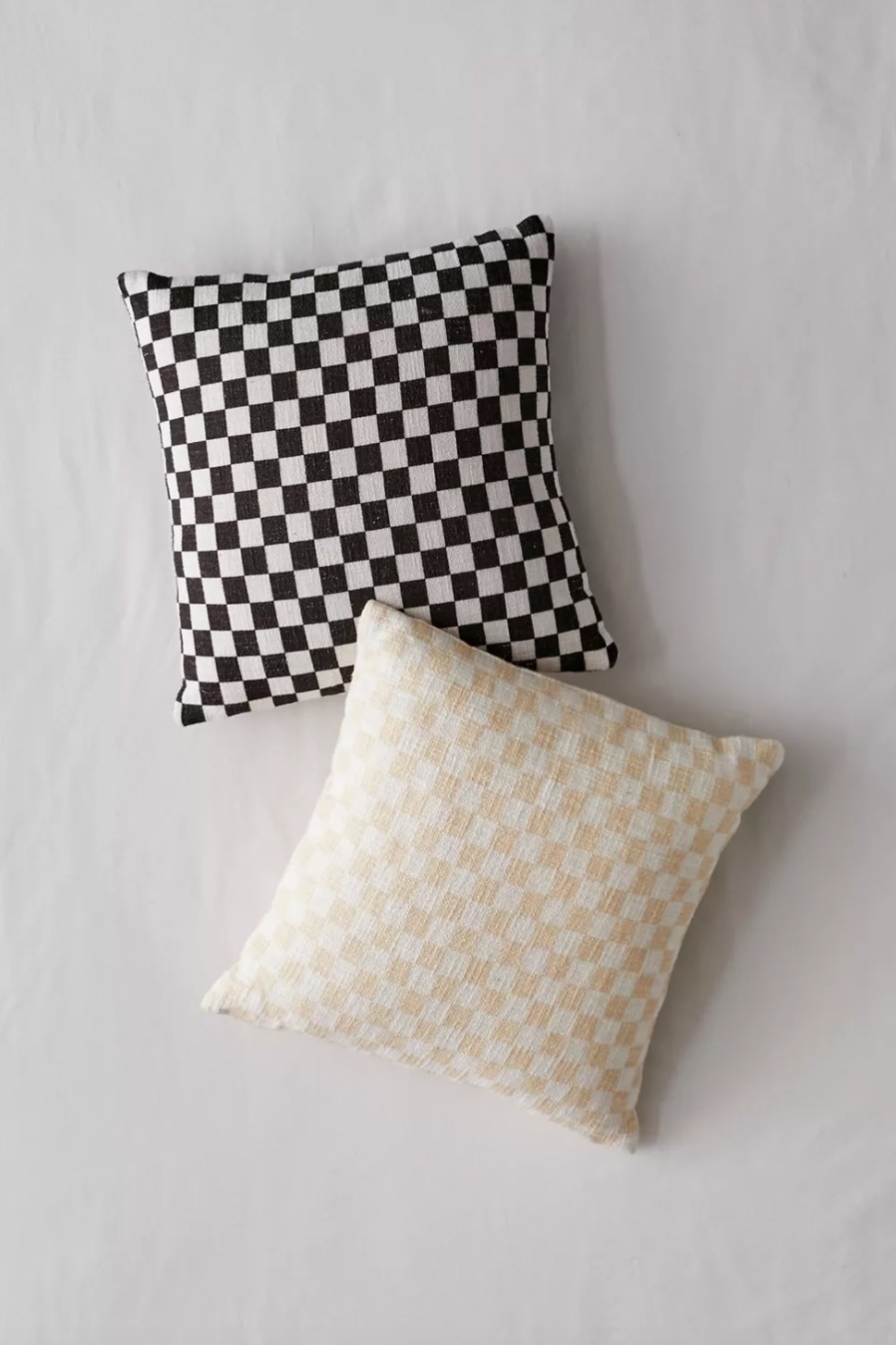 the checkerboard throw pillows in black and taupe