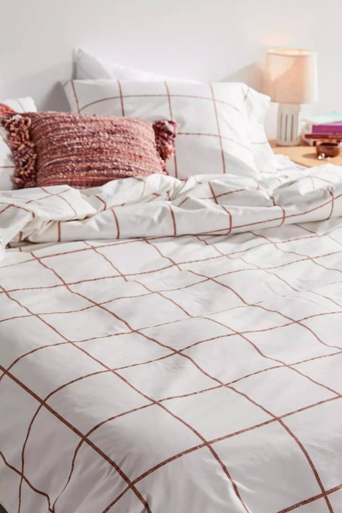 the distressed checked duvet in white and light brown