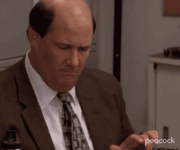 Kevin Malone plugging numbers into calculators on &quot;The Office&quot;