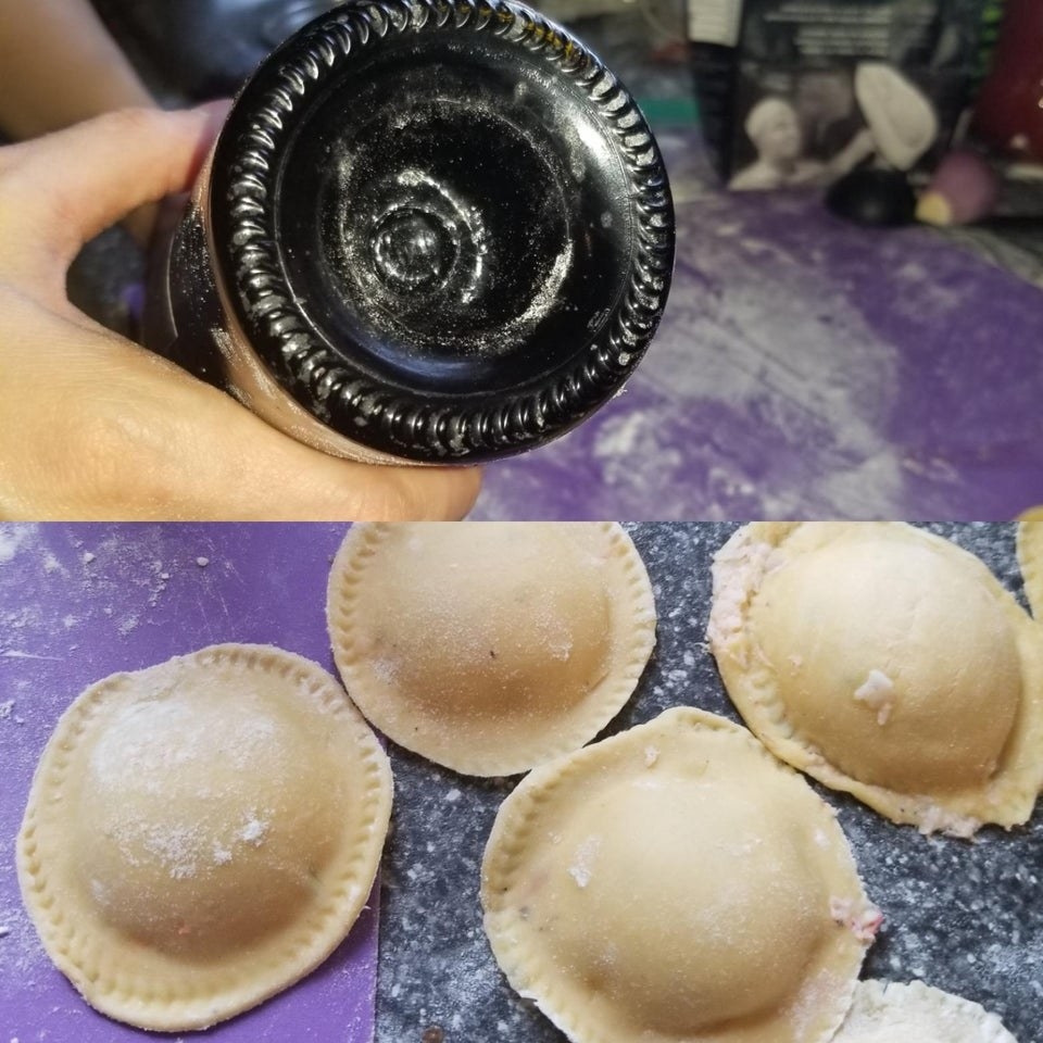 Homemade ravioli pressed with a wine bottle.