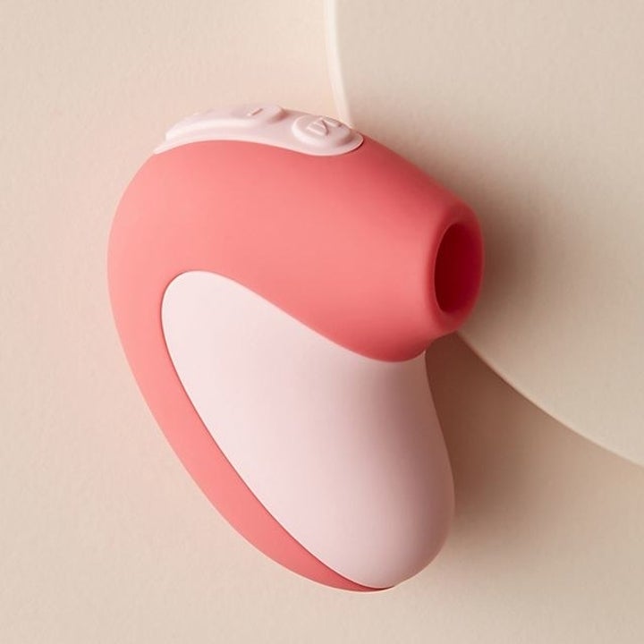 Pink compact suction vibrator