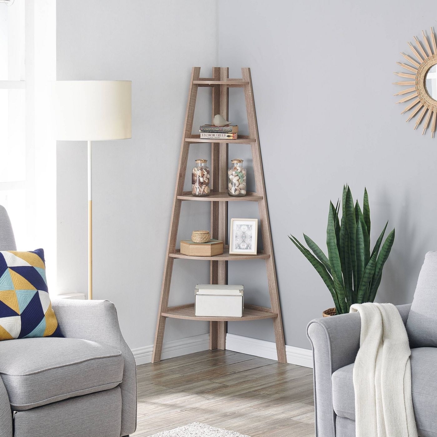oak colored corner shelf with tripod frame and 5 rounded shelves