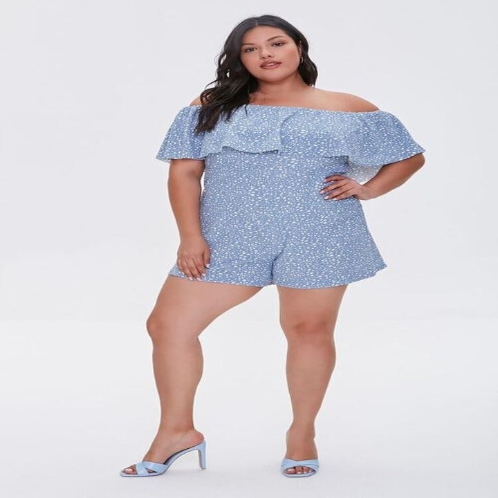 model wearing a blue romper