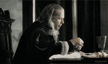 Denethor eating, with juice running down his mouth