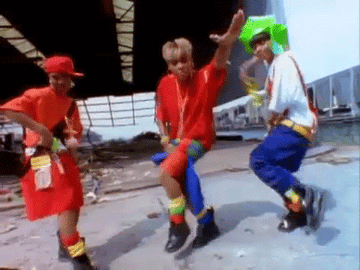 gif of tlc in the music video for &quot;Ain&#x27;t 2 Proud 2 Beg&quot;