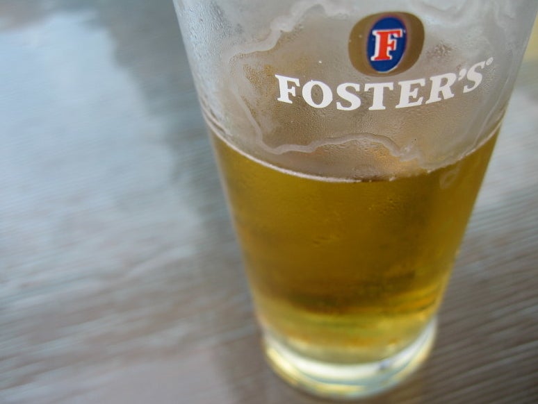 A large glass of Foster&#x27;s beer