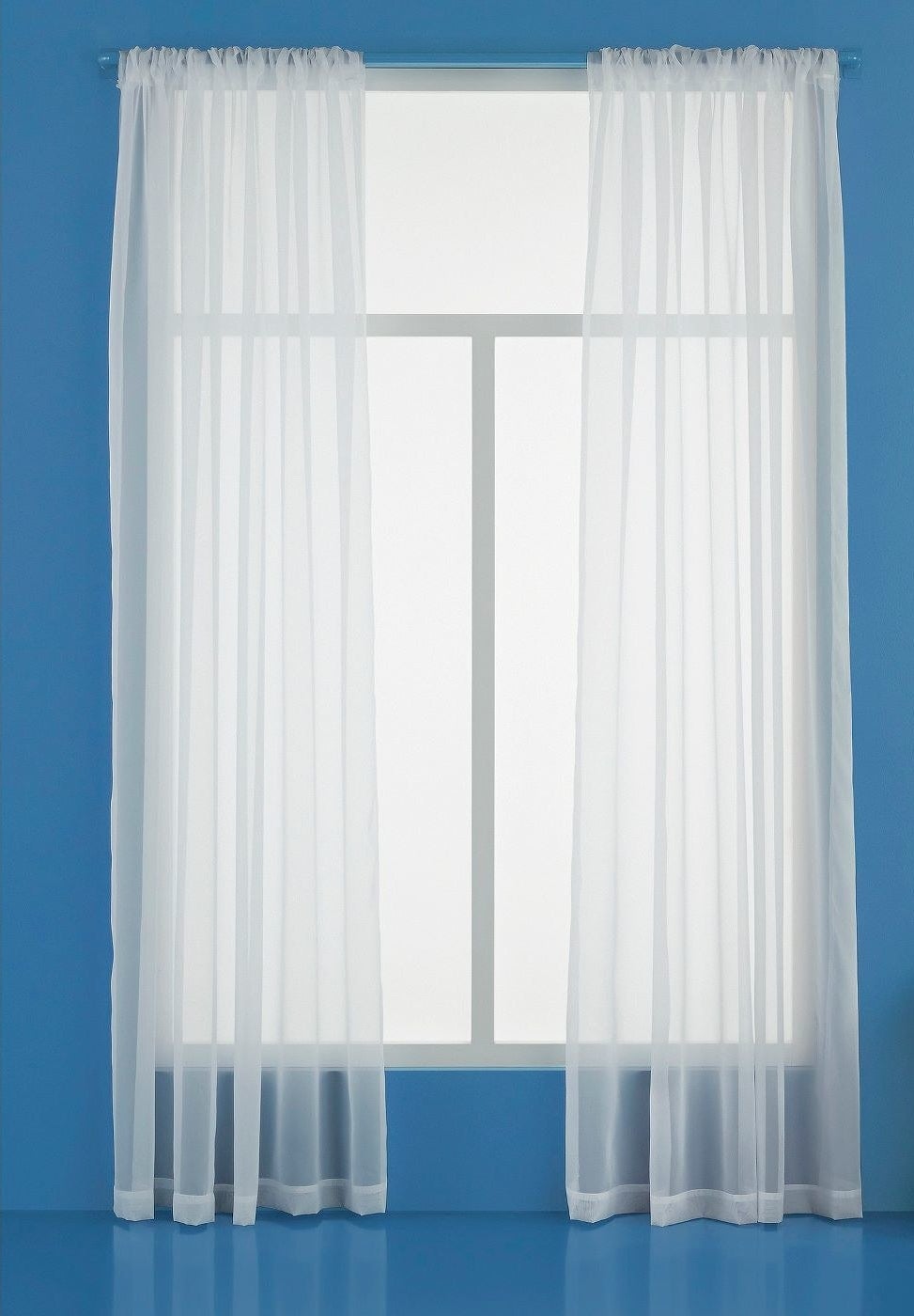 The white sheer curtains