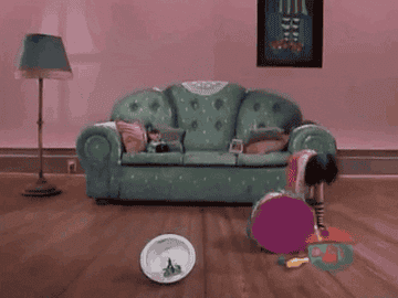 gif of loonette from &quot;big comfy couch&quot; running around her couch