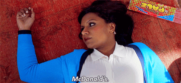 Mindy Kaling lying on the ground saying &quot;McDonald&#x27;s&quot;