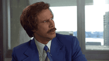 Ron Burgundy looks off in frustration before yelling, &quot;What is this? Amateur hour?&quot;