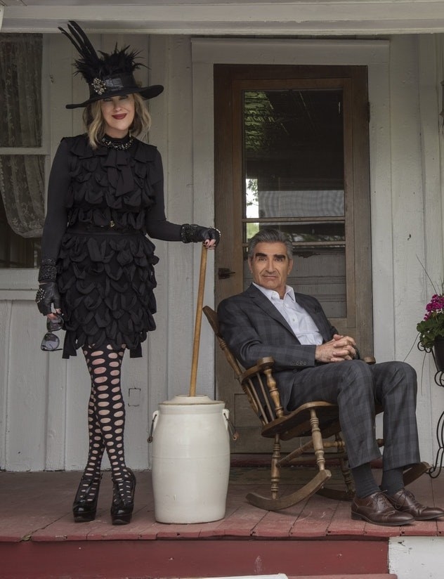 Moira and Johnny Rose on a porch in Amish Country