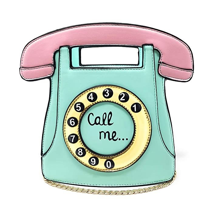 A pastel teal and pink bag shaped like a vintage rotary telephone