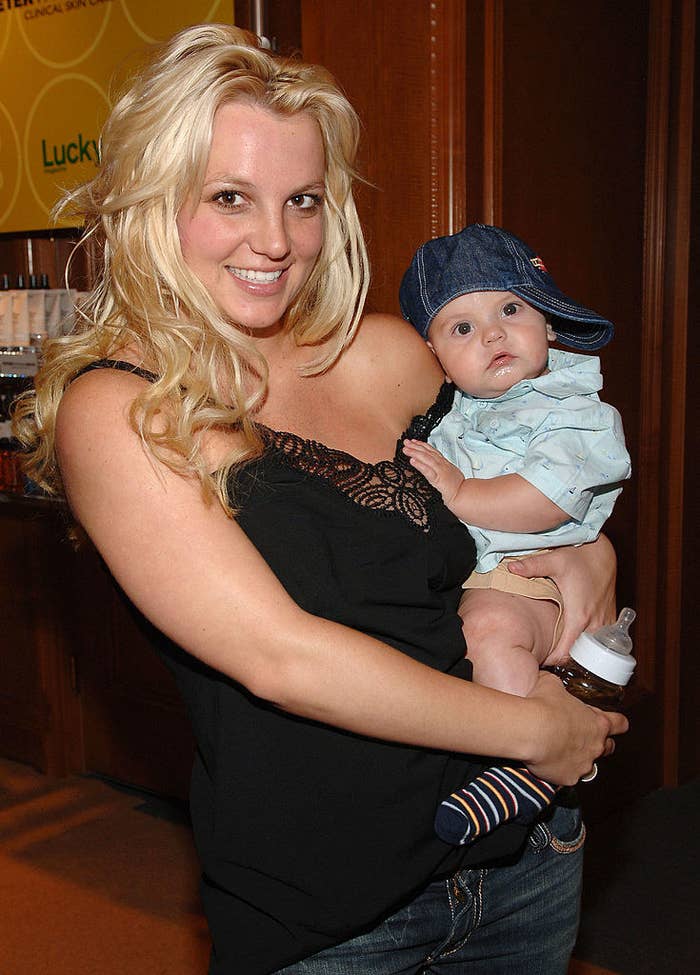 Britney holding one of her sons when he was a baby
