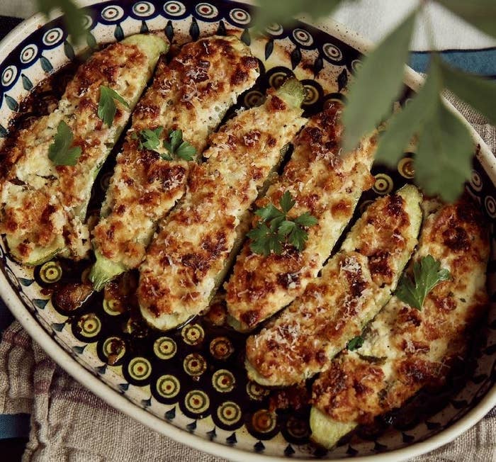 Overhead shot of zucchini halves stuffed with ham and