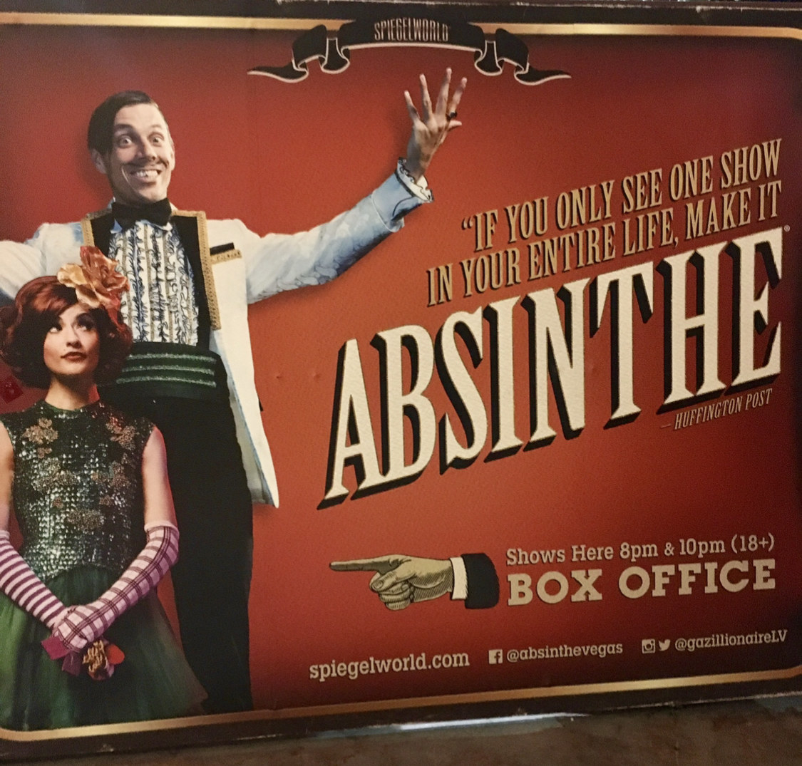 Absinthe sign outside of Caesar&#x27;s Palace and the performance tent.