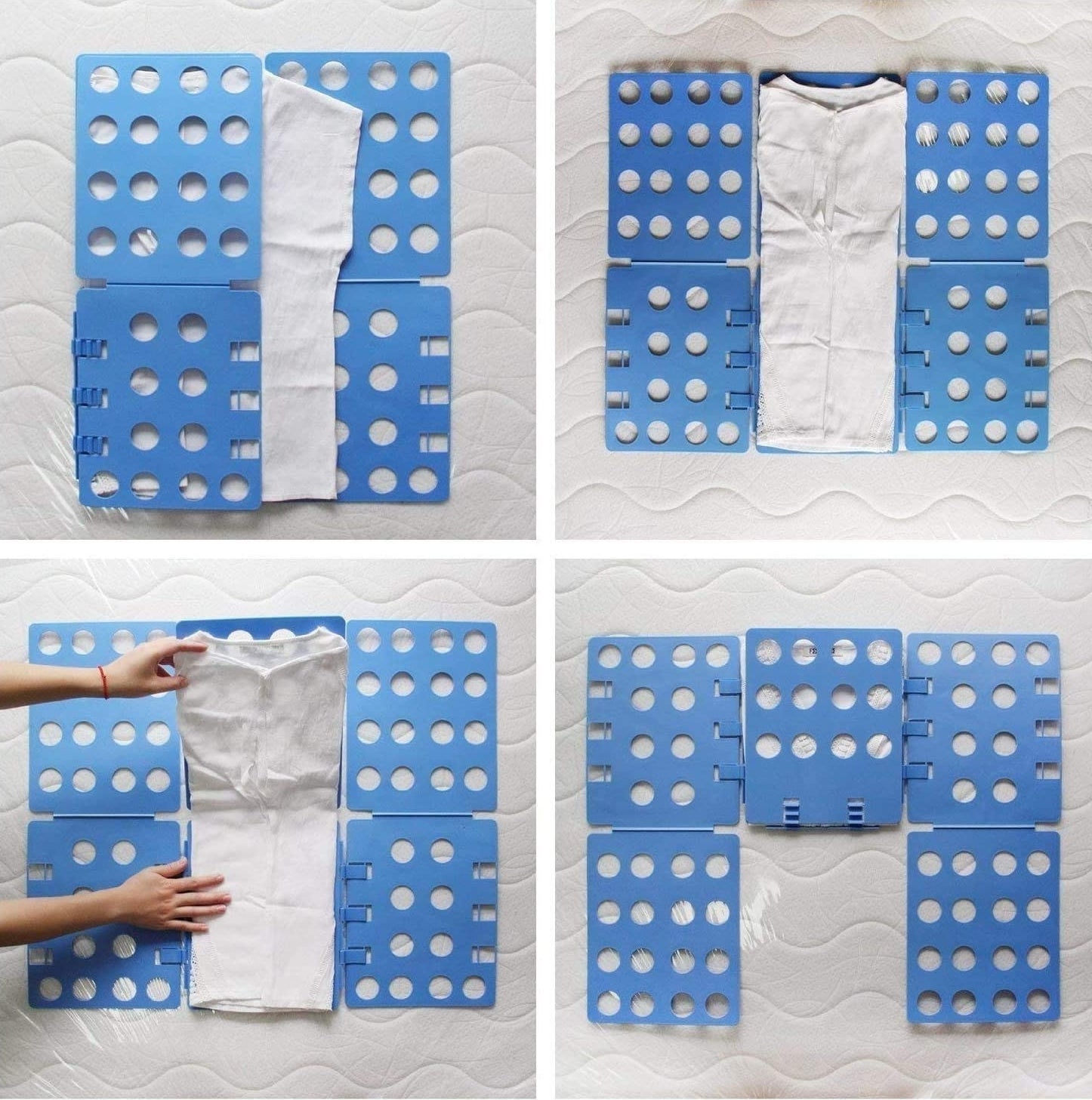 A person using the mat to fold a T-shirt