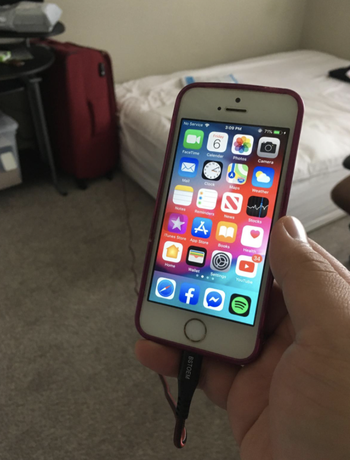 reviewer image of phone charging using cable