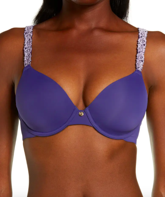 A model wearing the bra in dark iris/frosted purple