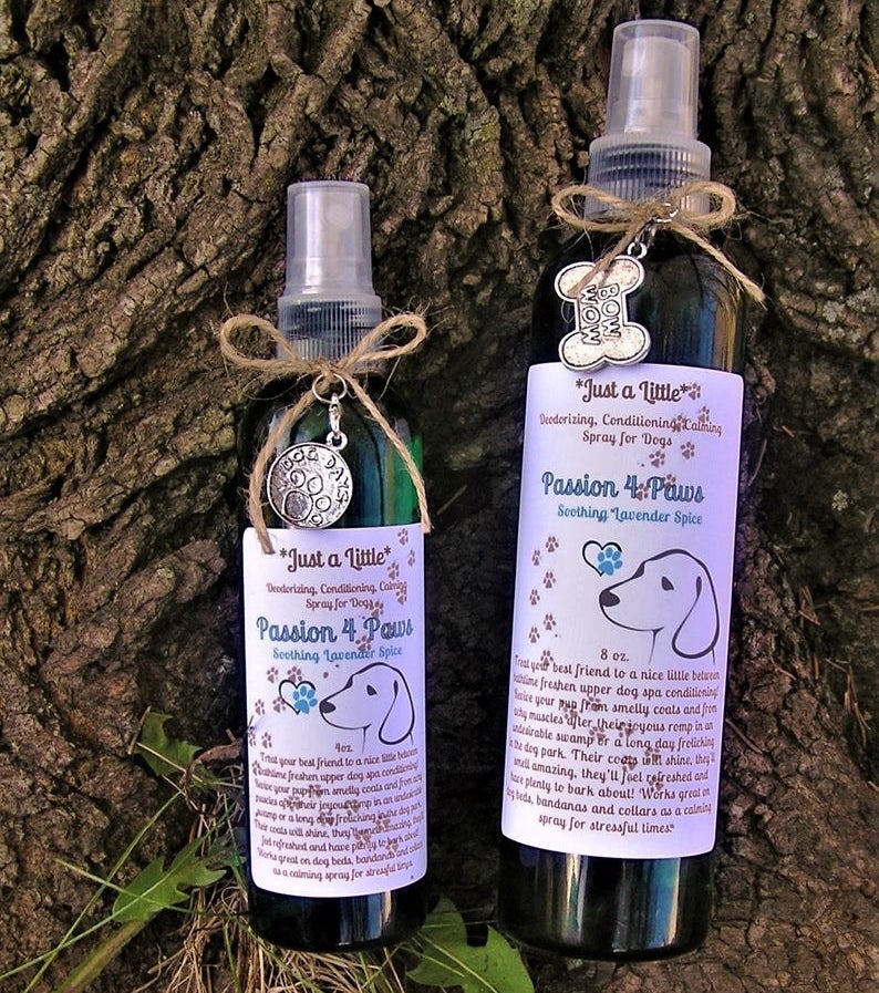a gif of two different-sized spray bottles of the deodorizing spray
