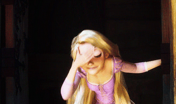 Rapunzel pushing her hair back in Tangled