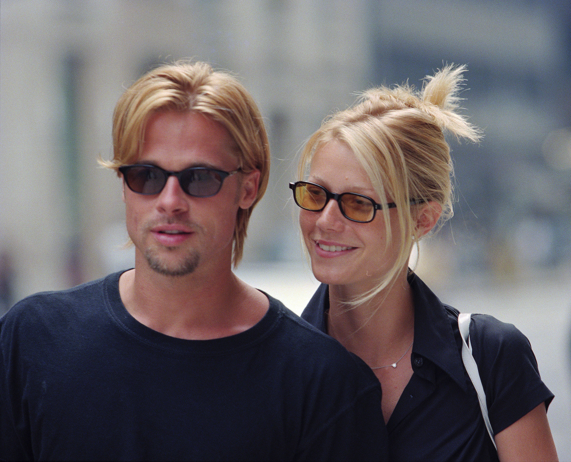 Brad and Gwyneth both dressed in black and walking down the street of NYC