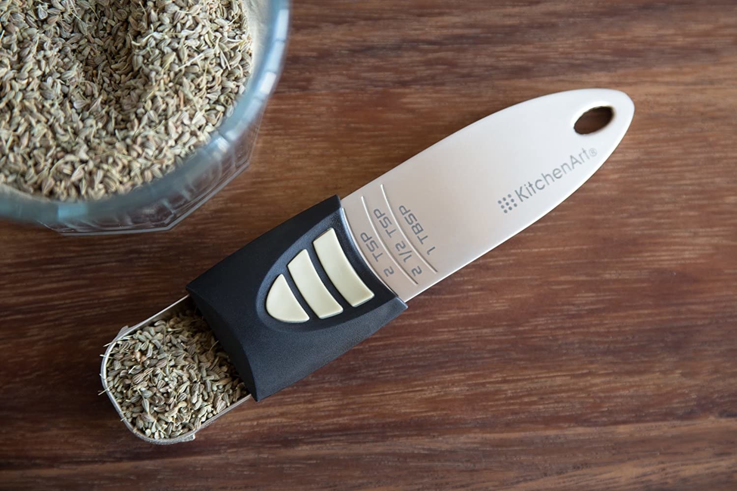 The measuring spoon with herbs on it
