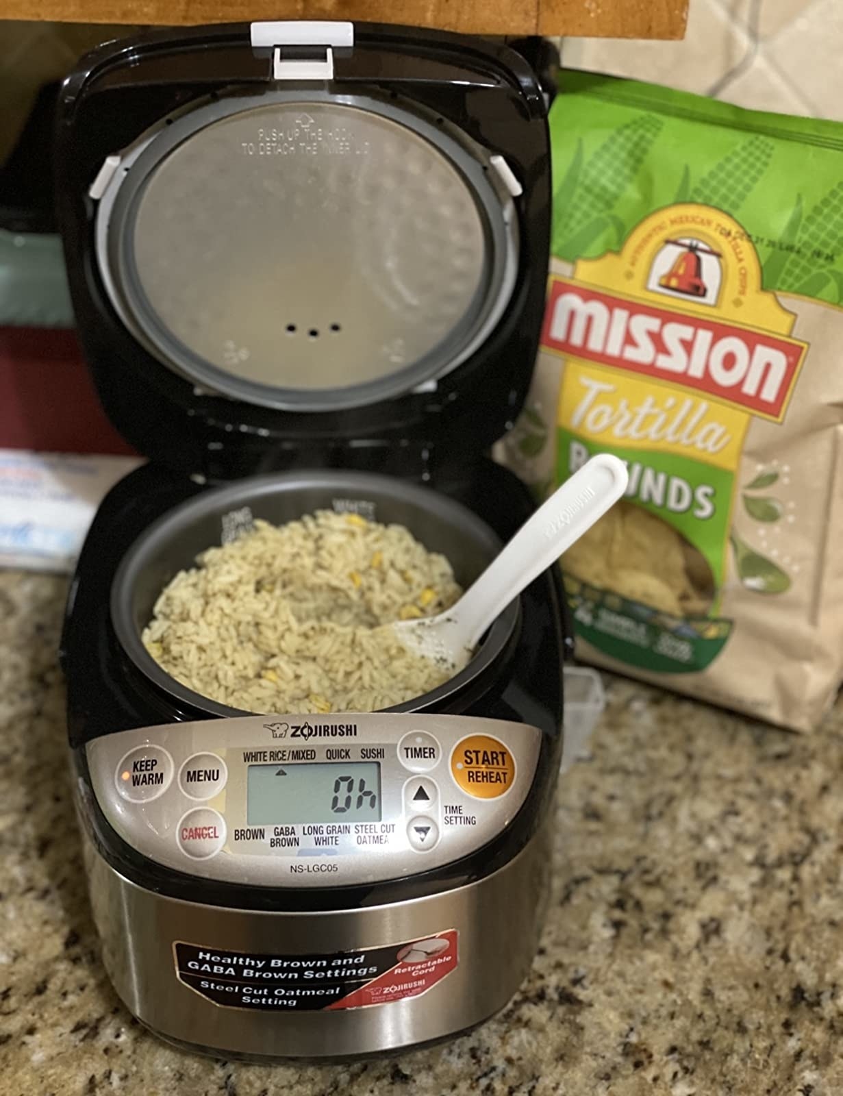 Reviewer photo of the rice cooker with rice inside