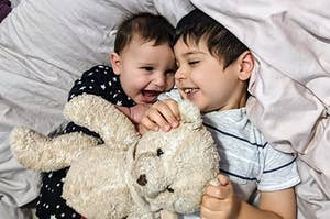 Kids with Dennis Basso Teddy Bear named Stompy