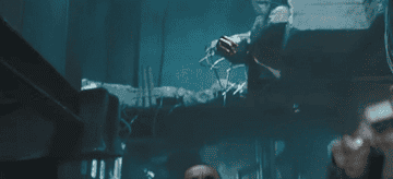 Idris Elba shooting a gun in The Dark Tower