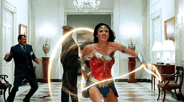 Wonder Woman using her whip