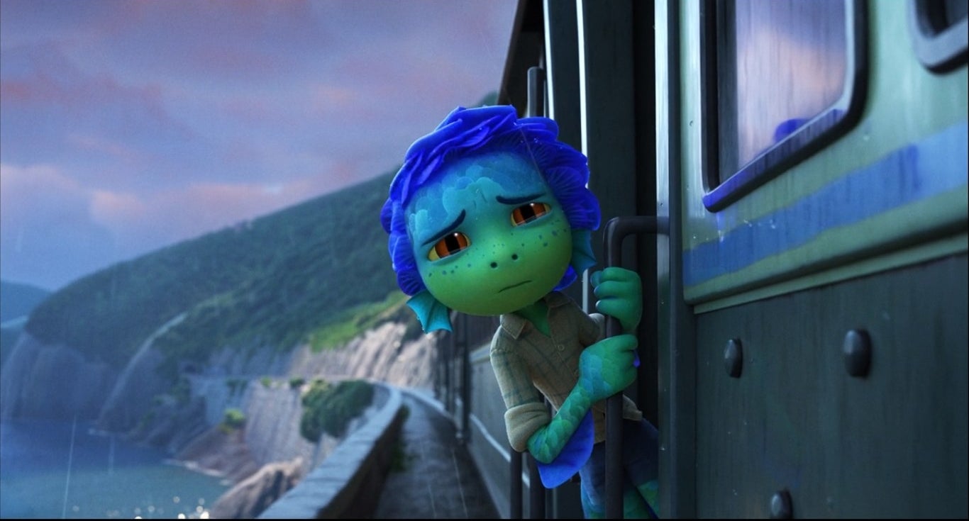 Sea monster Luca hanging out of a train