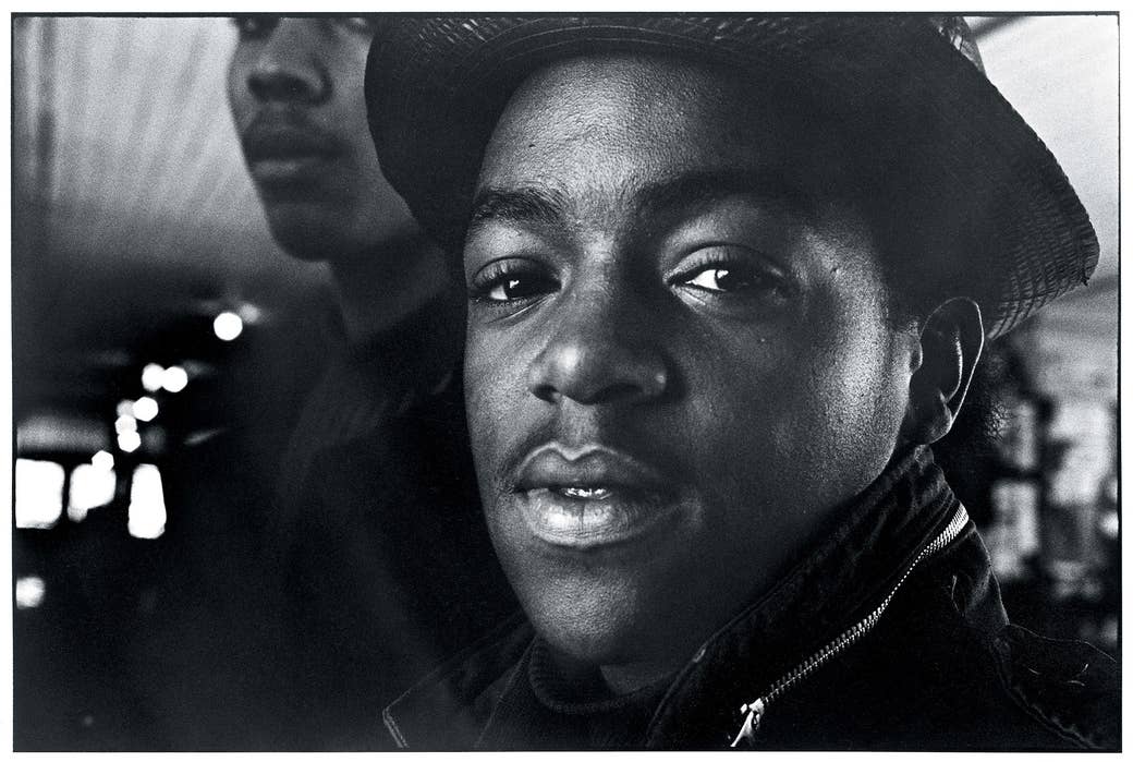 Close-up black-and-white portrait of a Black teenager