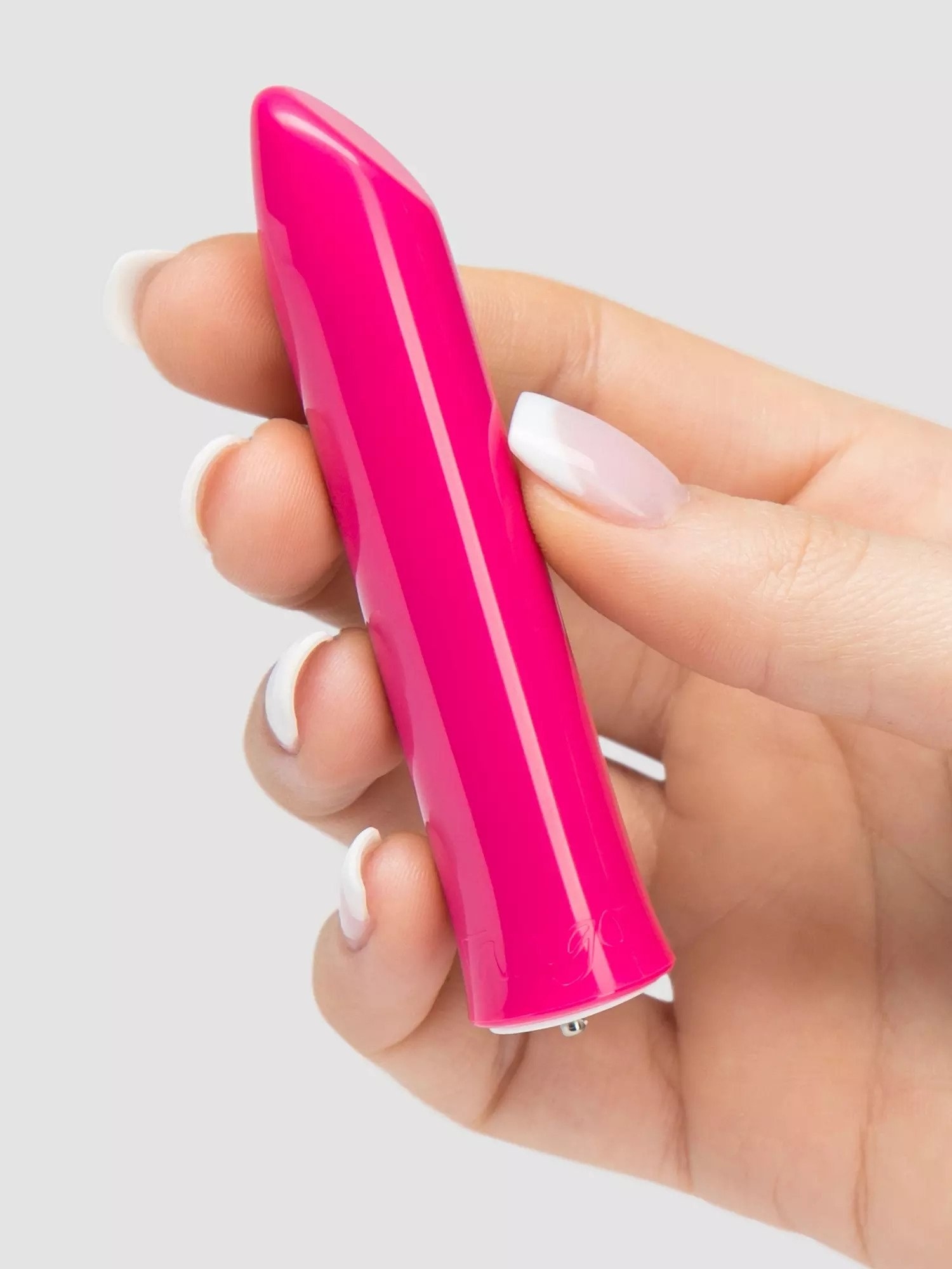 Model holding pink bullet vibrator