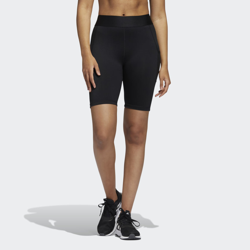 model wearing black bike shorts