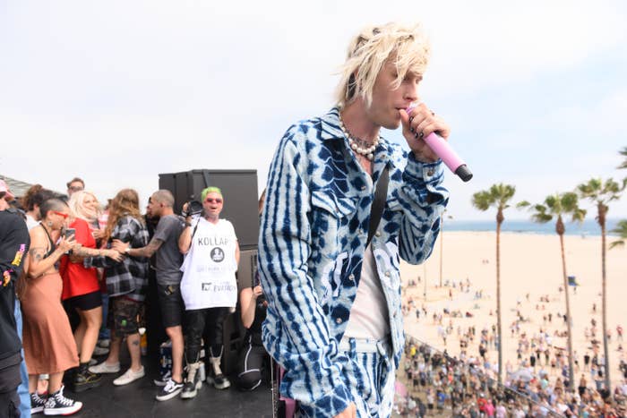 Machine Gun Kelly performs onstage at a concert in Venice Beach
